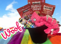 Title: “Pretty in Pink Dog Gift Basket: Toys & Chewy Treats”